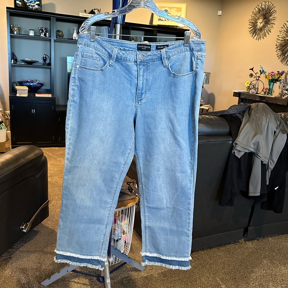 Susan Graver light blue jeans with frayed bottom. Size 16P